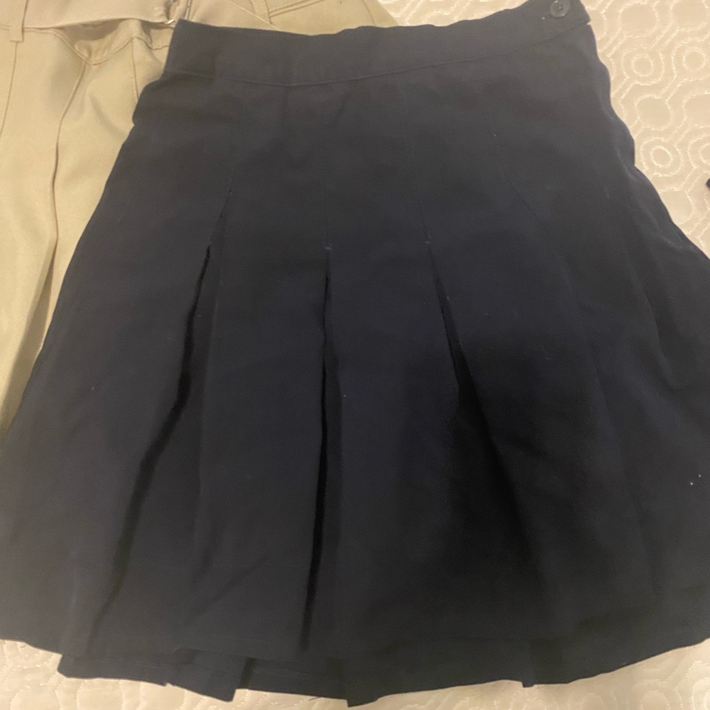 TWO Girls uniform skirts: size 12, one navy, one khaki